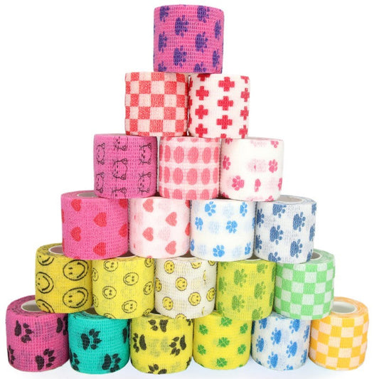 Stack of colorful patterned tape rolls on a white background