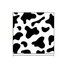 Vaca blanca y negra
