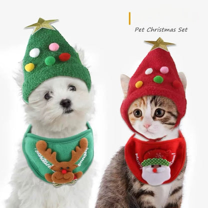 Two pets, a dog and a cat, wearing Christmas-themed hats and bibs on a white background.