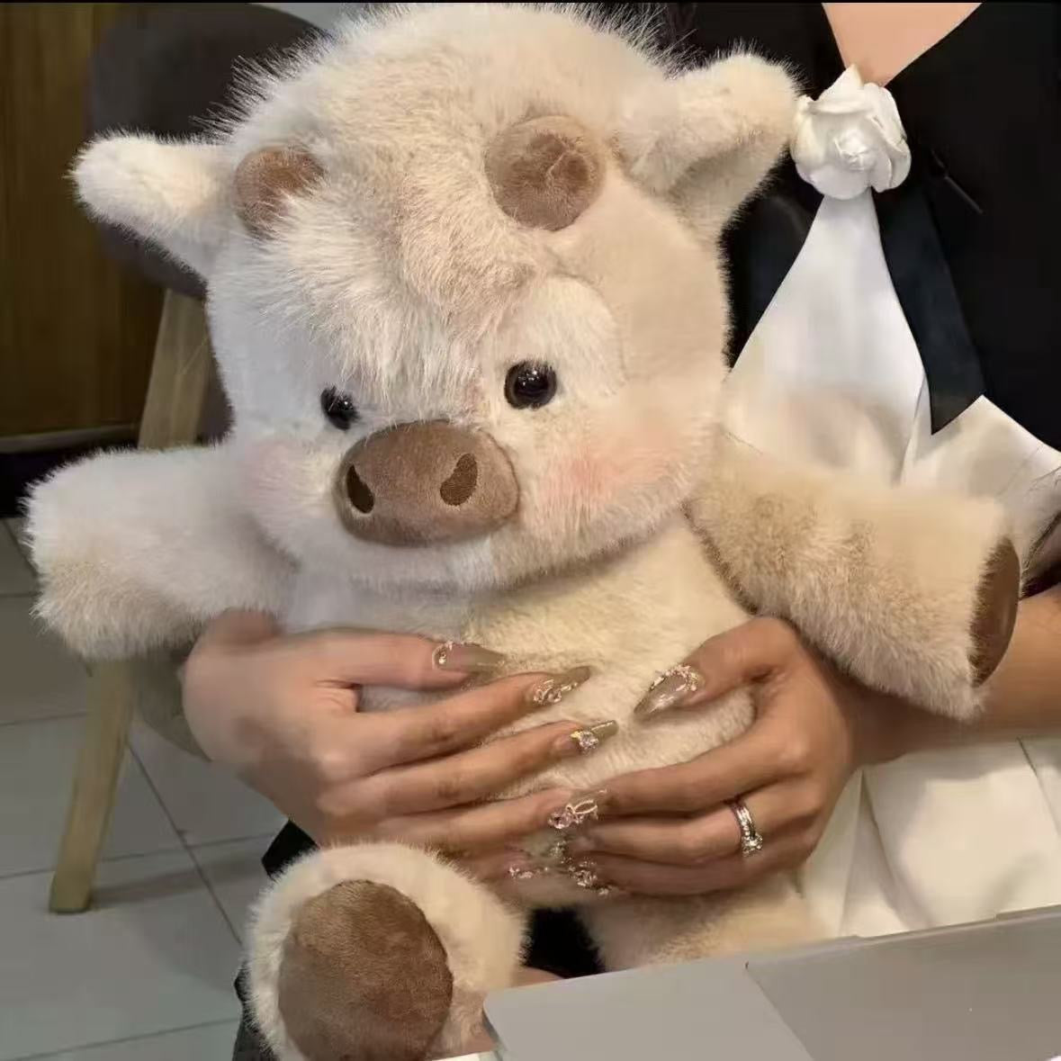 Snuggle cattle plush toy
