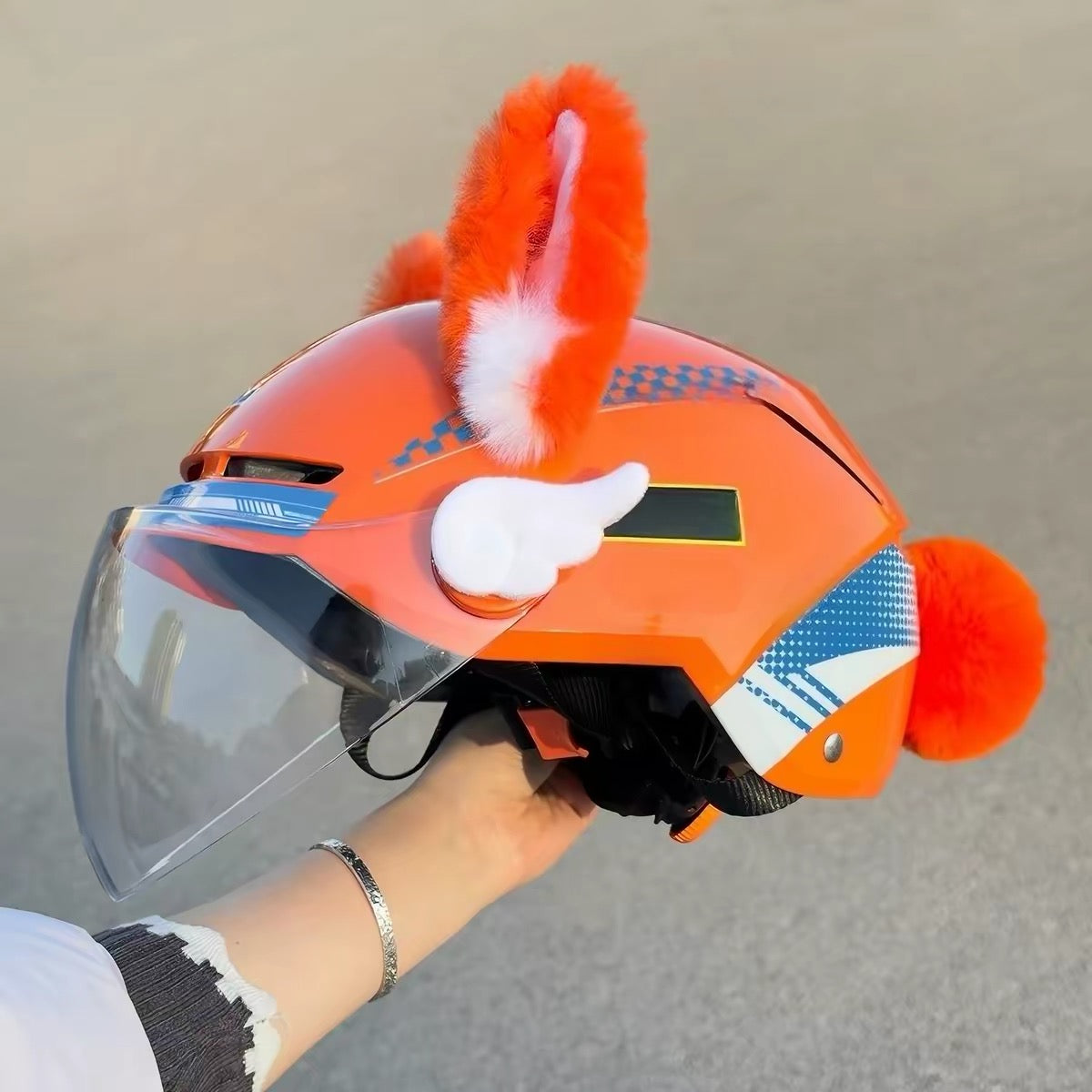 Moving ear for helmet