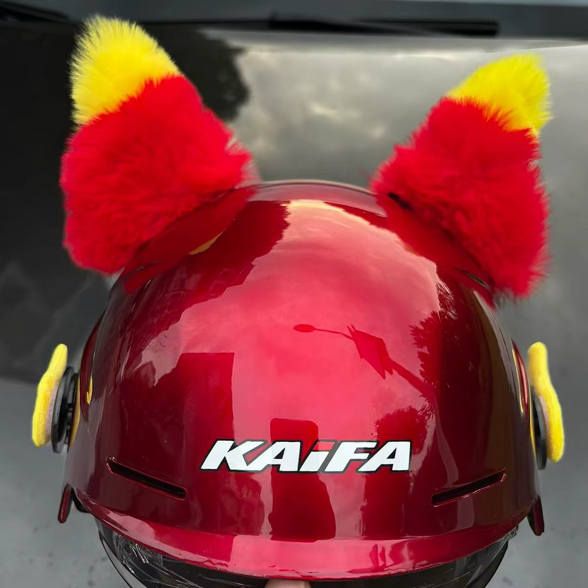 Moving ear for helmet