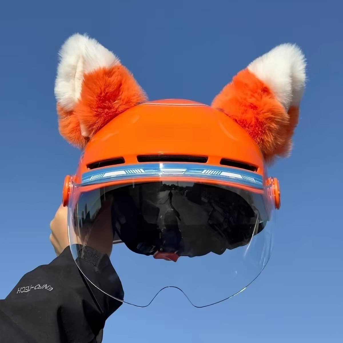 Moving ear for helmet