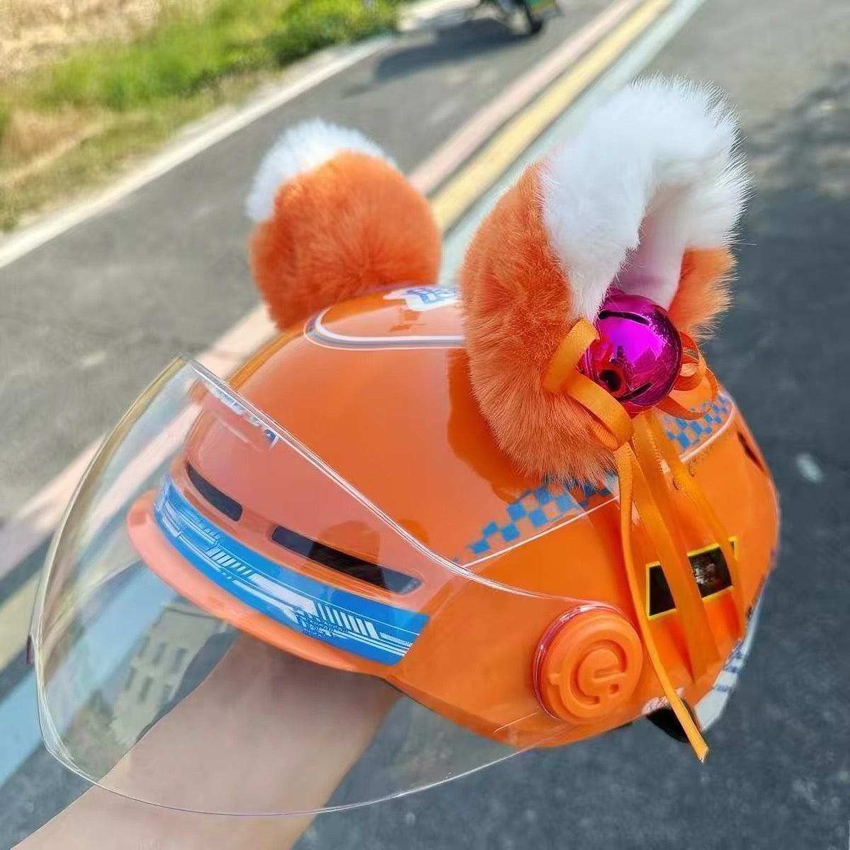 Moving ear for helmet