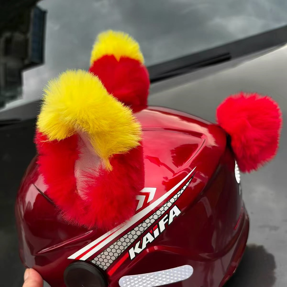 Moving ear for helmet